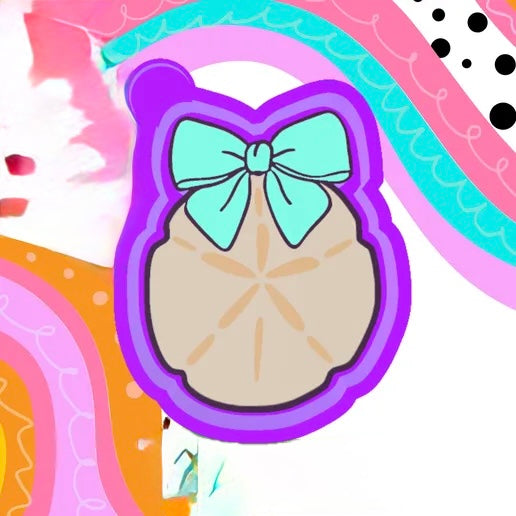 Sand dollar with bow