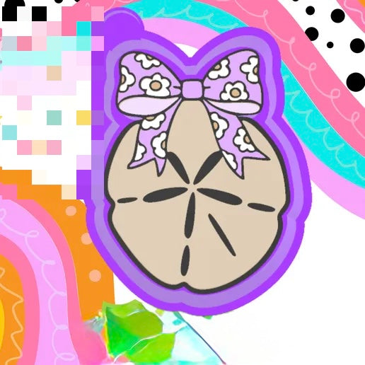 Sand dollar with daisy bow