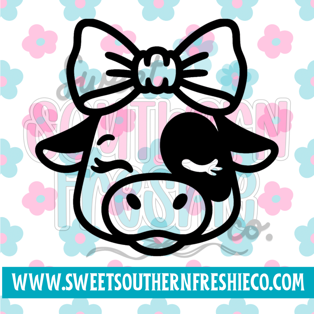 Winking cow with bow