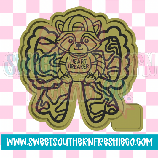 Heart breaker raccoon