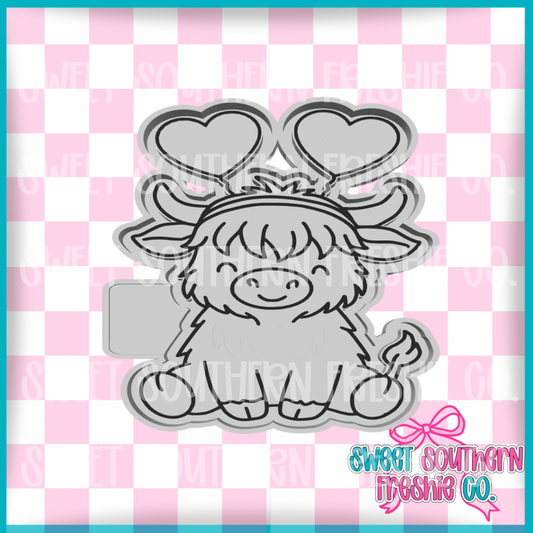 Highland Cow With Heart Antennas