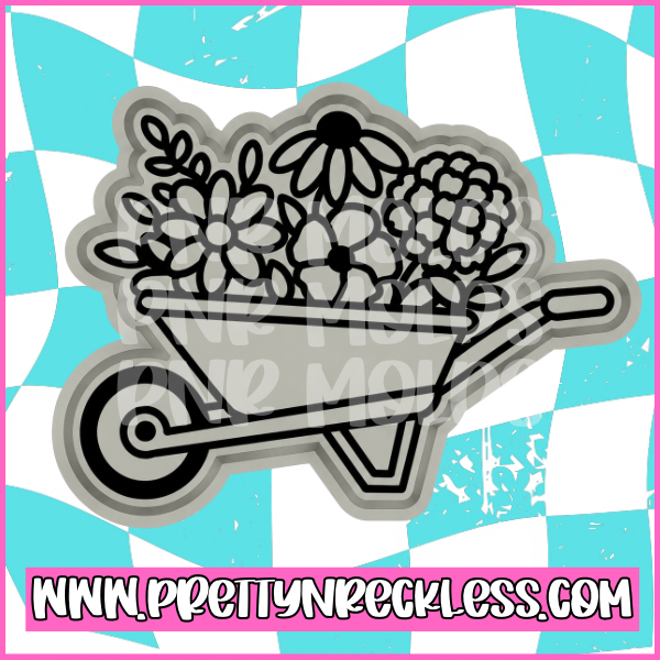 Wheel barrel with fall flowers