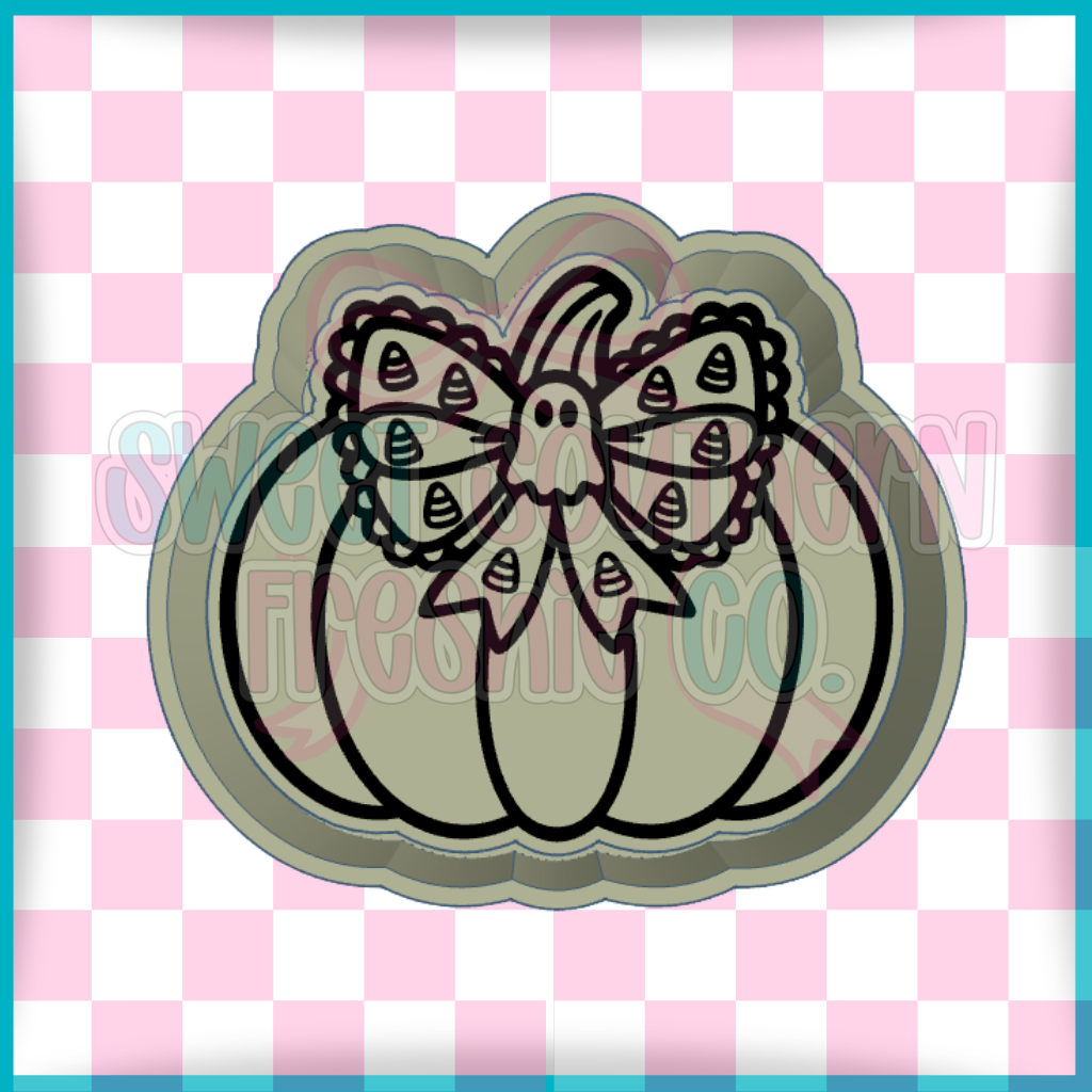 Pumpkin with ghost and candy corn bow